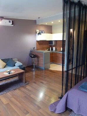 Studio suite | Woonruimte | Flatscreentelevisie