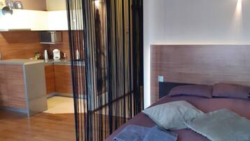 Studio Suite | Desk, laptop workspace, soundproofing, iron/ironing board