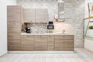 Apartment, 1 Bedroom | Private kitchen | Full-sized fridge, microwave, oven, stovetop - New apartment in front of Ara Pacis (Rome)