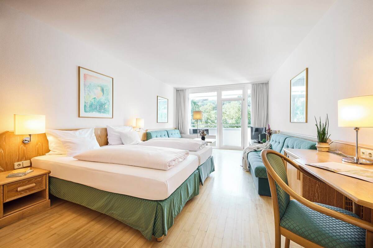 Economy Room | Hypo-allergenic bedding, in-room safe, desk, blackout curtains