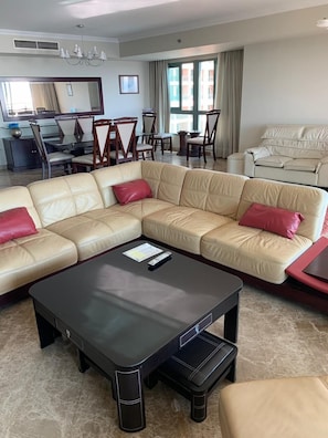 Apartment, Sea View (Three-Bedroom Apartment) | Living area | Flat-screen TV - Apartment at San Stefano Grand Plaza (Alexandria)