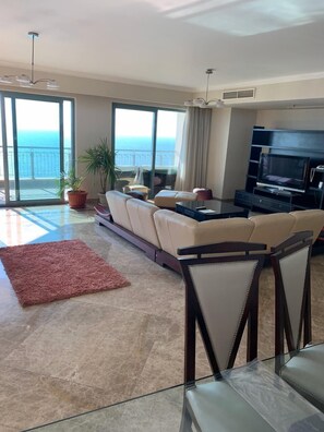 Apartment, Sea View (Three-Bedroom Apartment) | Living area - Apartment at San Stefano Grand Plaza (Alexandria)