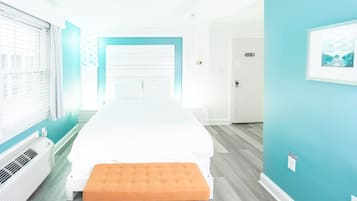 1 bedroom, desk, iron/ironing board, travel crib