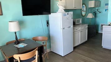 Fridge, microwave, cookware/dishes/utensils