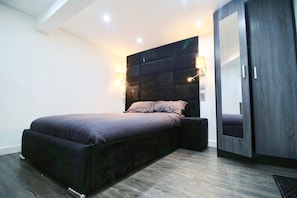 Apartment, 1 Bedroom | 1 bedroom, iron/ironing board, free WiFi, bed sheets