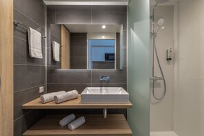 Shower, free toiletries, hair dryer, towels