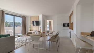 Superior Apartment, 3 Bedrooms, Terrace (8 Pers) | Living area | Flat-screen TV