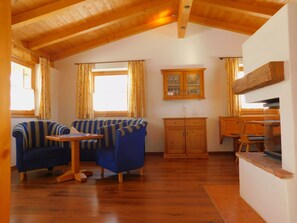 Basic Chalet, 2 Bedrooms | Living area | Flat-screen TV, fireplace, iPod dock, heated floors