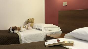 Standard Triple Room | Desk, blackout drapes, soundproofing, cribs/infant beds