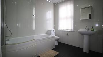 House, 2 Bedrooms | Bathroom | Combined shower/bathtub, hair dryer, towels, soap