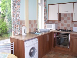 Flat A | Private kitchenette | Full-size fridge, microwave, oven, stovetop - The Tops Self Catering (Leeds)
