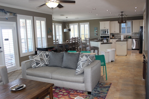 Open living area with extensive windows to spectacular views over the water.