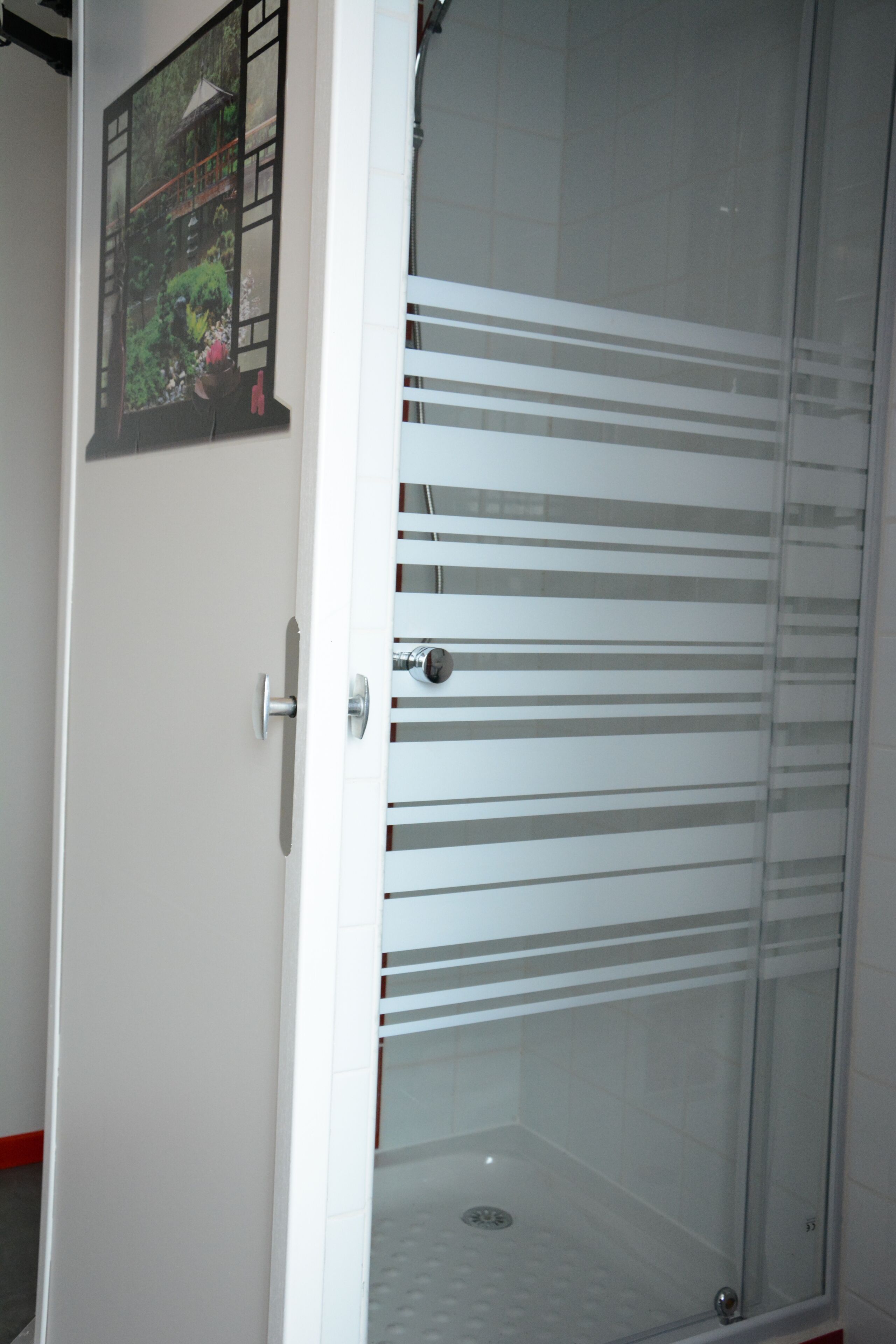 family room, shared bathroom | bathroom shower