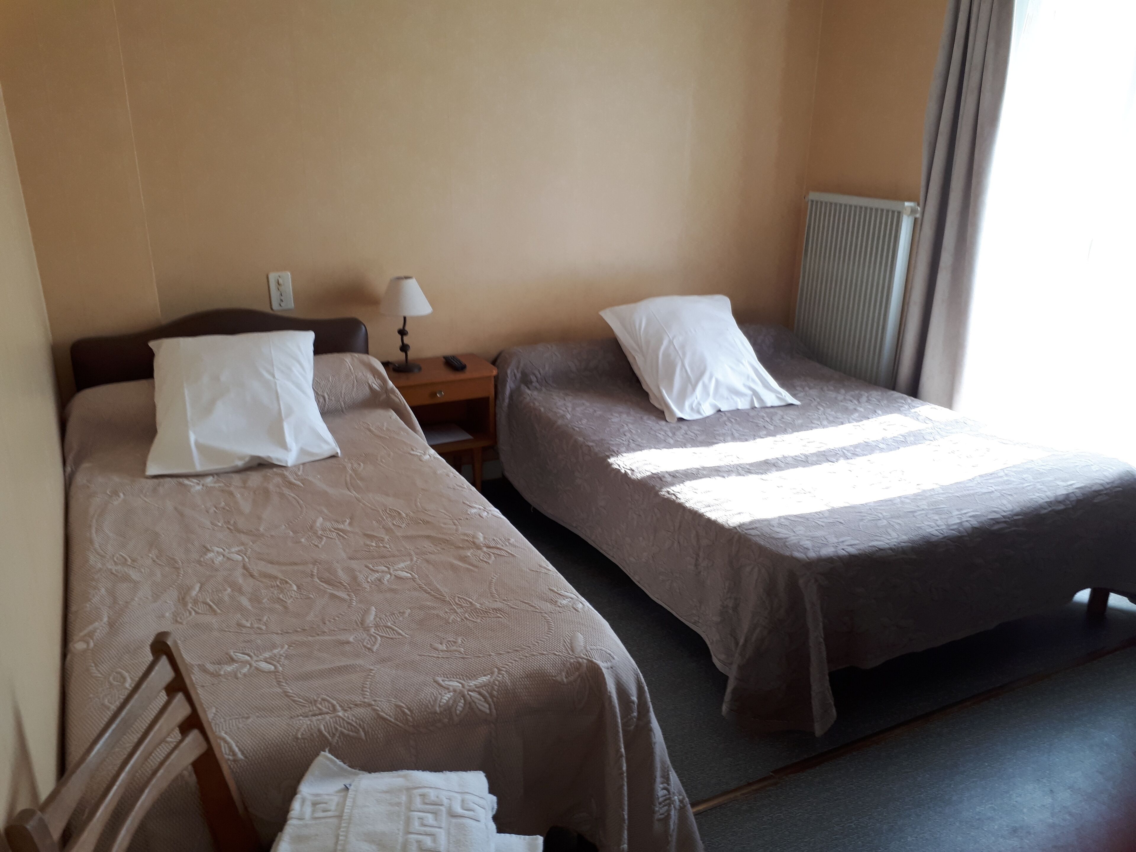 triple room, shared bathroom | free cots/infant beds, free wifi, bed sheets