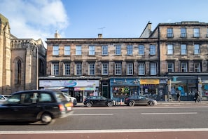 Experience the charm of a traditional city center, surrounded by historic buildings and local shops.