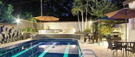 Outdoor pool, pool umbrellas, pool loungers