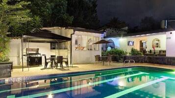 Outdoor pool, pool umbrellas, pool loungers