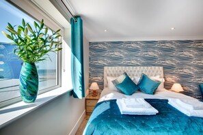 2 habitaciones, tabla de planchar con plancha y cuna de viaje 