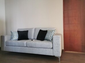 Luxury Apartment, Terrace, City View | Living room | 49-inch flat-screen TV with satellite channels, Smart TV - Residencial Cafferata (Lima)