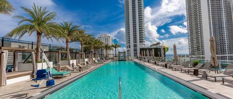 Outdoor pool, pool umbrellas, pool loungers