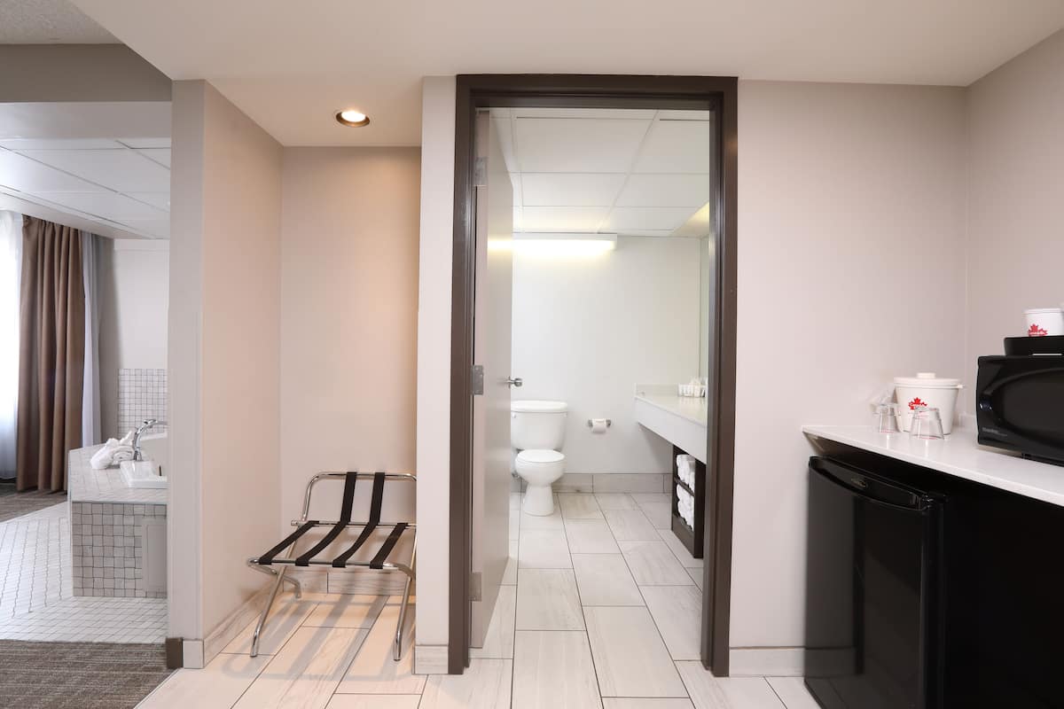 premium room | desk, laptop workspace, blackout curtains, iron/ironing board