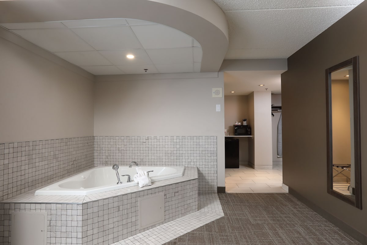 premium room | desk, laptop workspace, blackout curtains, iron/ironing board