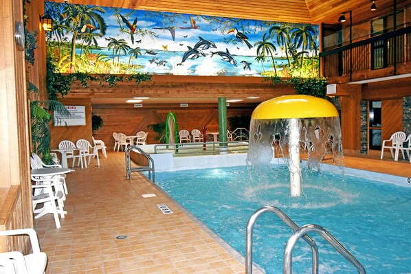 Indoor pool, open 8:00 AM to 10:00 PM, pool loungers