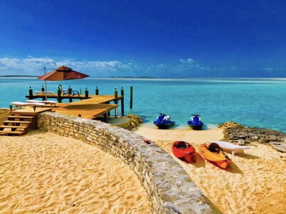  BEACH FRONT HOME WITH DOCK AND BEACH. Blue hole and sandbar nearby.