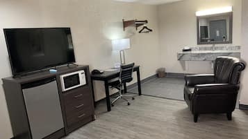 Standard Double Room, 2 Queen Beds | Living area | 40-inch LED TV with cable channels, TV
