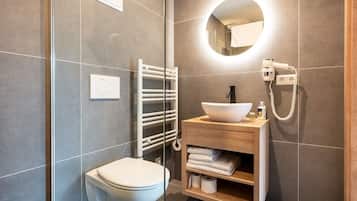 Family Studio | Bathroom | Shower, free toiletries, bathrobes, slippers