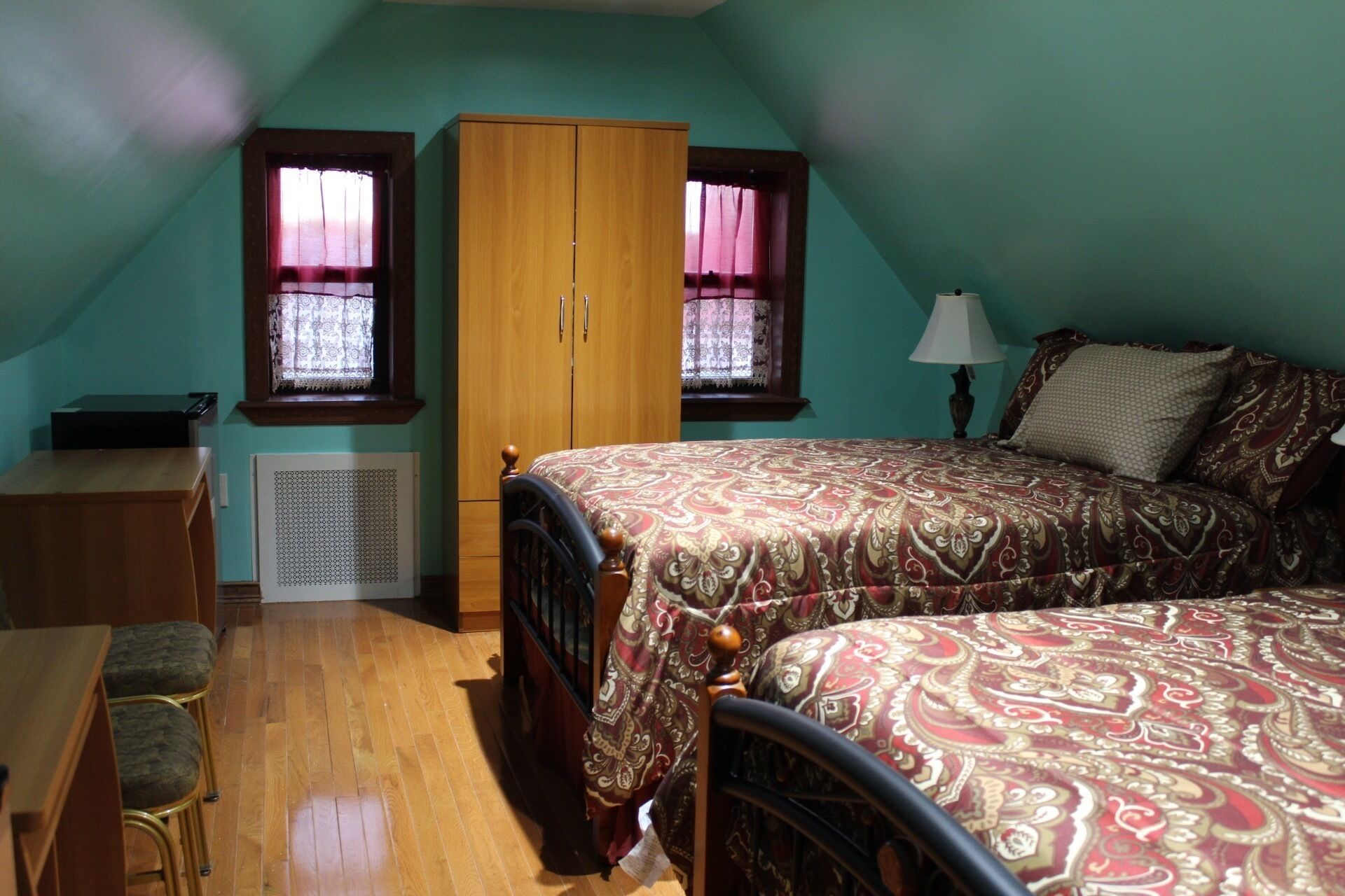 Room, 2 Queen Beds, Shared Bathroom | Individually decorated, individually furnished, laptop workspace