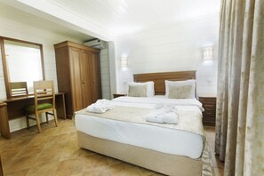 Premium bedding, down duvets, in-room safe, laptop workspace