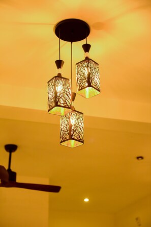 A ceiling with three hanging pendant lights. - Cara White House (Galle)