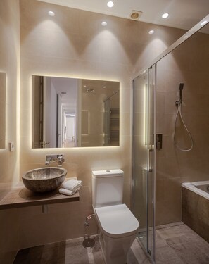 Combined shower/bathtub, hair dryer, towels, soap