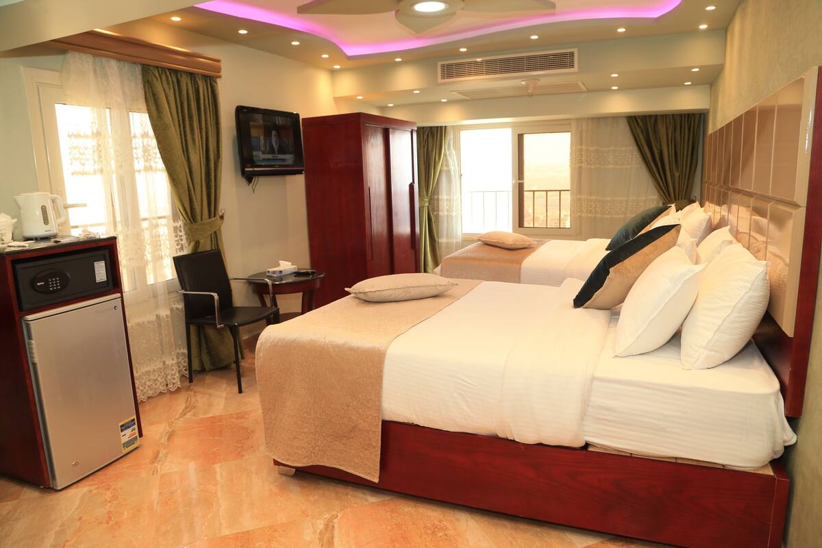 Deluxe Double Room | Minibar (free items), desk, blackout drapes, soundproofing