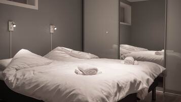 2 slaapkamers, een strijkplank/strijkijzer, reisbedje, gratis wifi