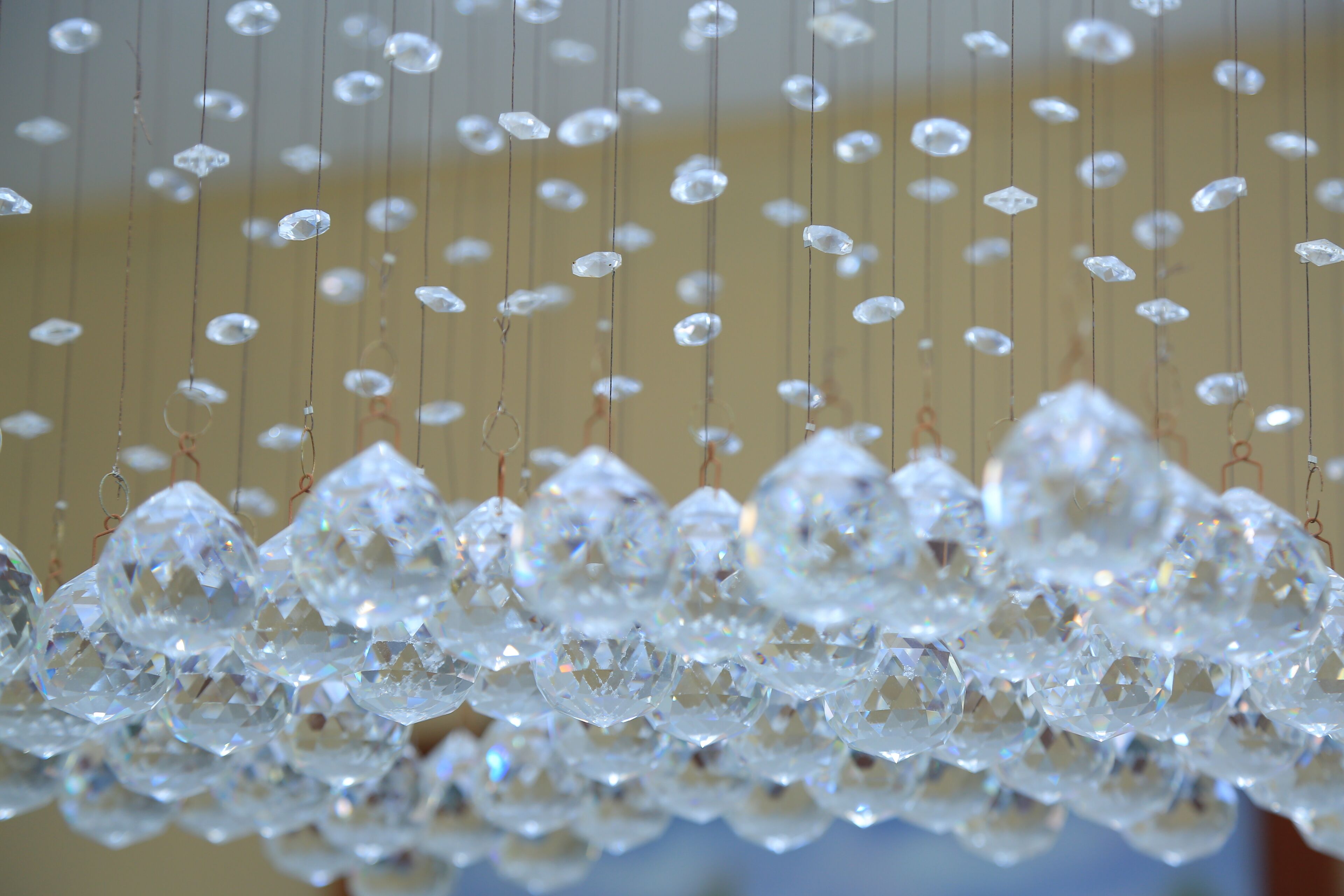 A chandelier with multiple hanging crystal elements.
