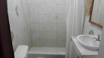 Shower, rainfall showerhead, towels, soap