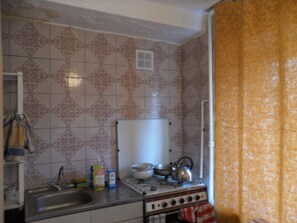 Fridge, electric kettle, dining tables