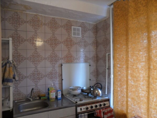 Fridge, electric kettle, dining tables