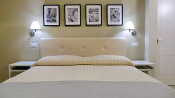 2 habitaciones, caja de seguridad en la habitación y escritorio