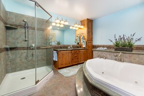 Bathtub, jetted tub, hair dryer, towels