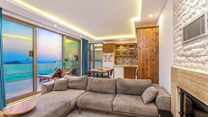 Flat-screen TV, fireplace, ping pong