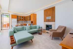 Flat-screen TV, fireplace, ping pong