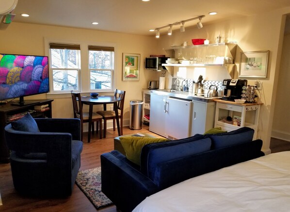 1 bedroom, desk, iron/ironing board, travel crib