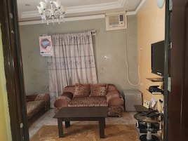Quarto presidencial | Sala de estar | TV 40 polegadas com canais digitais