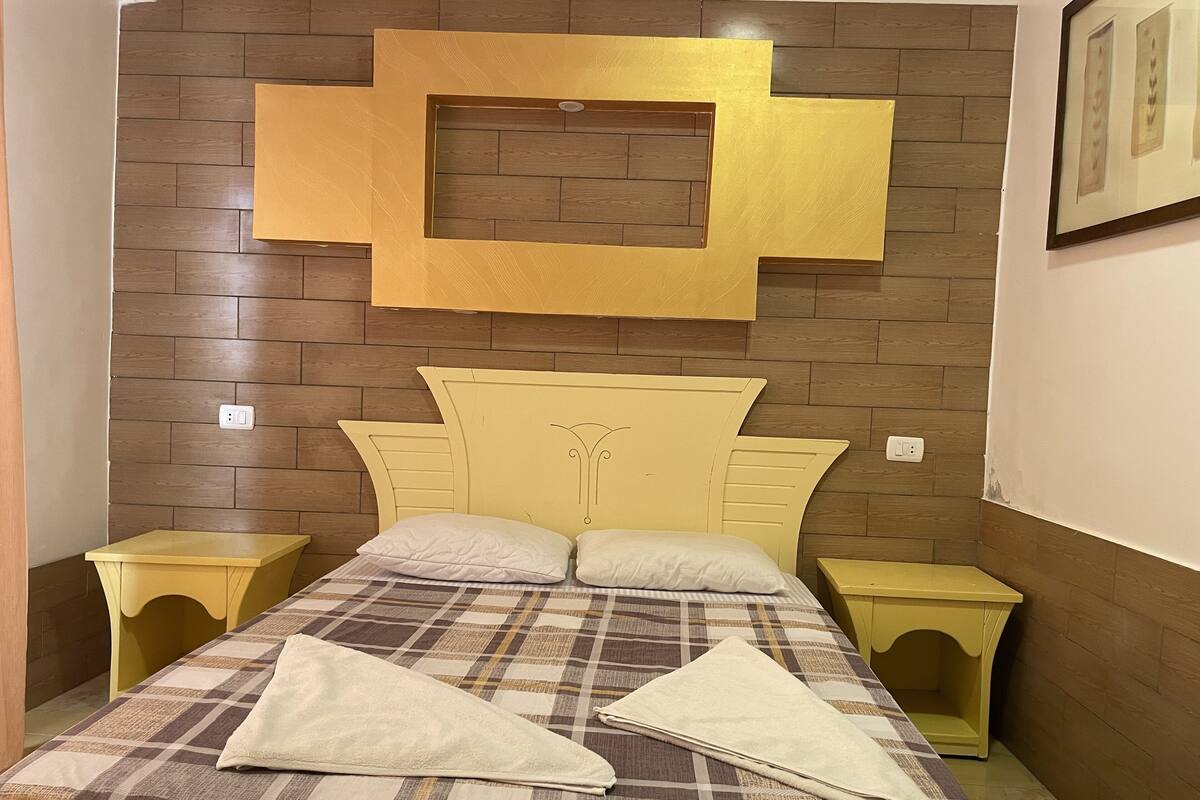 Down comforters, Select Comfort beds, minibar, desk