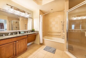 Combined shower/tub, hair dryer, towels, soap