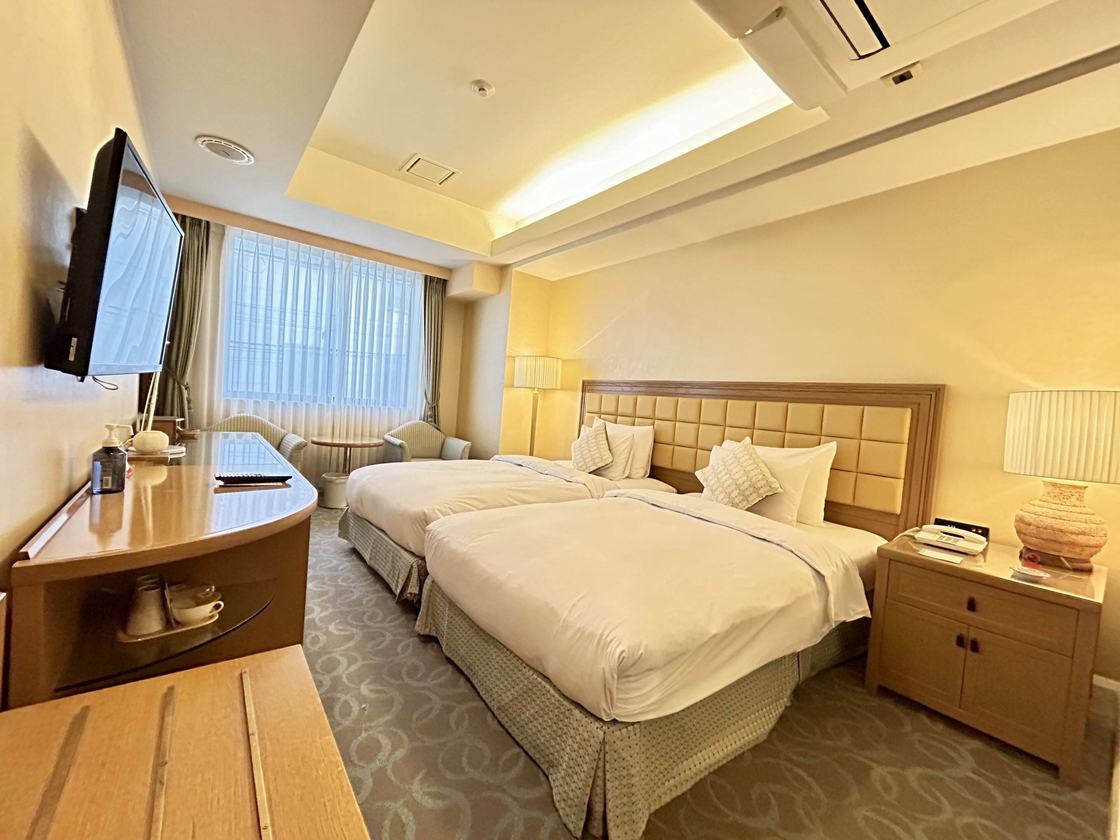 twin room | in-room safe, individually decorated, individually furnished, desk