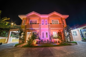 Front of property - evening/night - Amboy's Hometel (Basco)